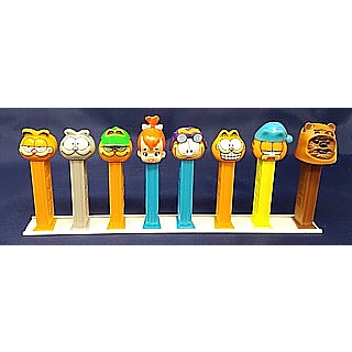 White PEZ Rails for Holding PEZ Dispensers Upright For Display